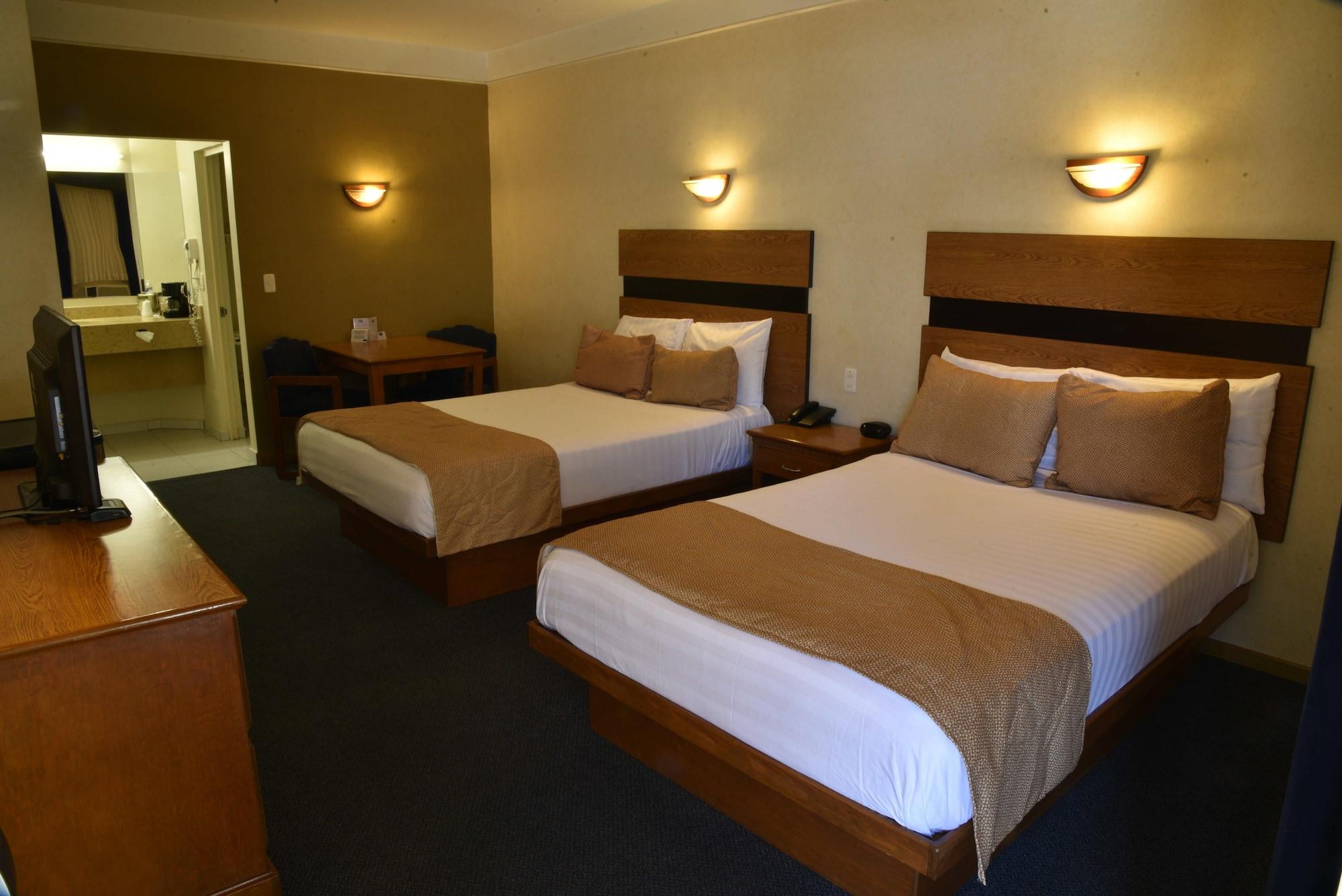 American Inn Hotel & Suites Parral Buitenkant foto